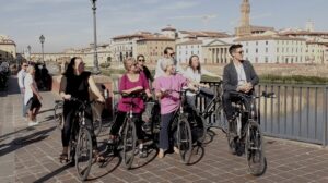 Florence: 2-Hour Guided Bike Tour - Meeting at via Cavour and getting setup: bike, helmet, headsets