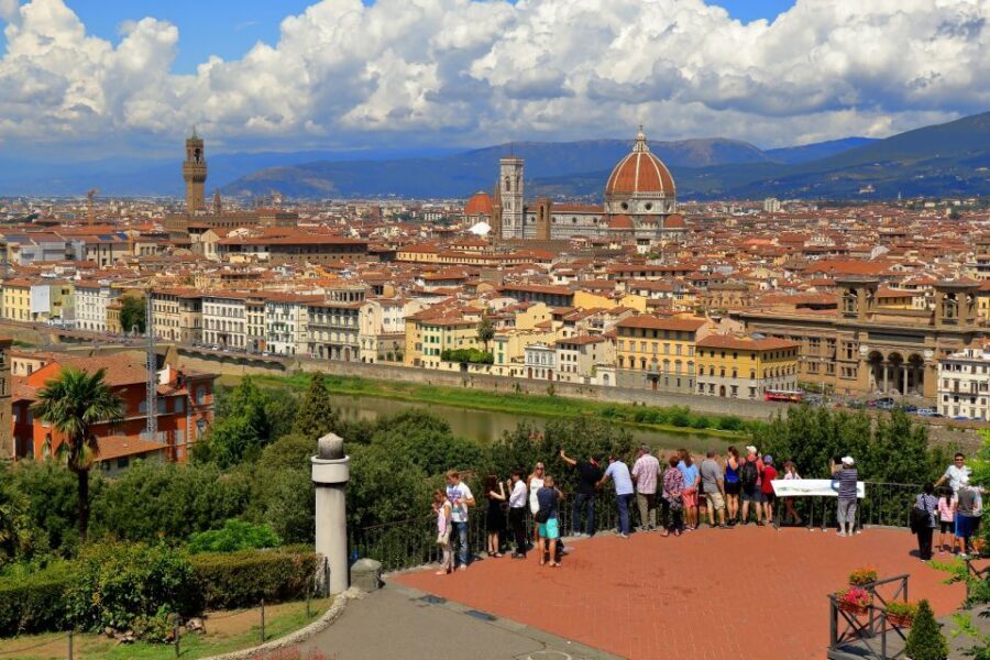Florence: City Sightseeing Guided Bike Tour - Getting Ready: Bikes, Helmets, Ponchos, and Safety Reality
