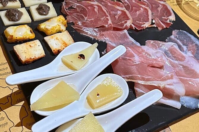 Florence Food Tour with Truffle Pasta, Steak & Free Flowing Wine - Stop One: Prosciutto, Cheese-Wine Mood, and 30-Year Balsamic