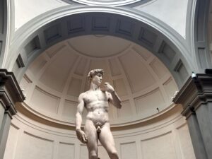 Florence: Michelangelo's David Entrance Ticket and Audio App - Where to meet: Carrefour Express and the ENJOY ROME flag