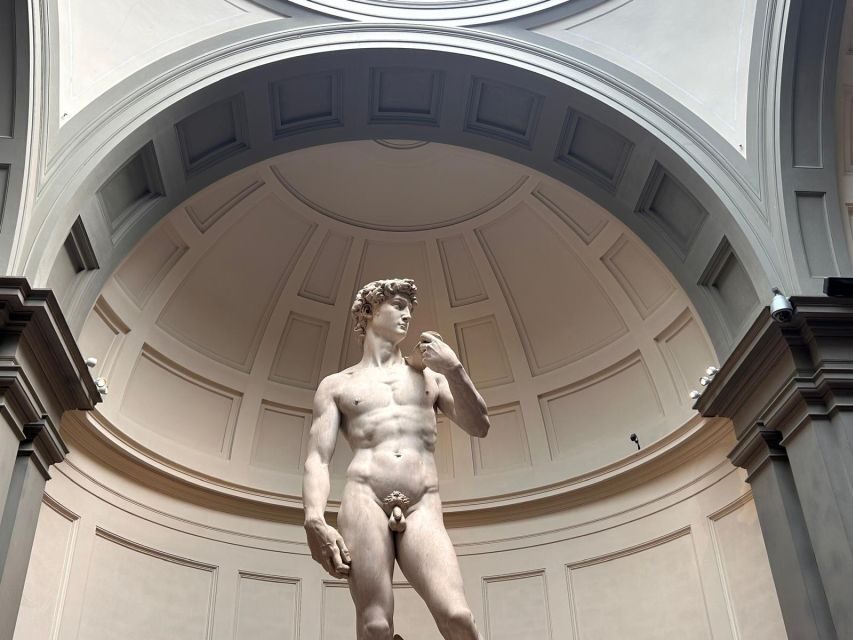 Florence: Michelangelo's David Entrance Ticket and Audio App - Where to meet: Carrefour Express and the ENJOY ROME flag