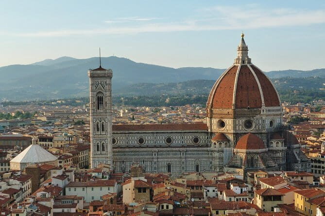 Florence Walk Tour + Wine Windows Option | Discover, Sip, Enjoy! - Orsanmichele and Via dei Calzaiuoli: a street with old-world origins