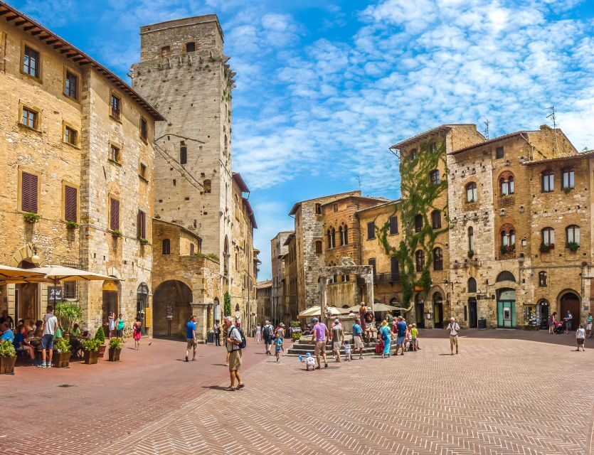 From Florence: Siena & San Gimignano Tour with Wine & Lunch - Leaving Florence: Piazzale Montelungo pickup and coach comfort