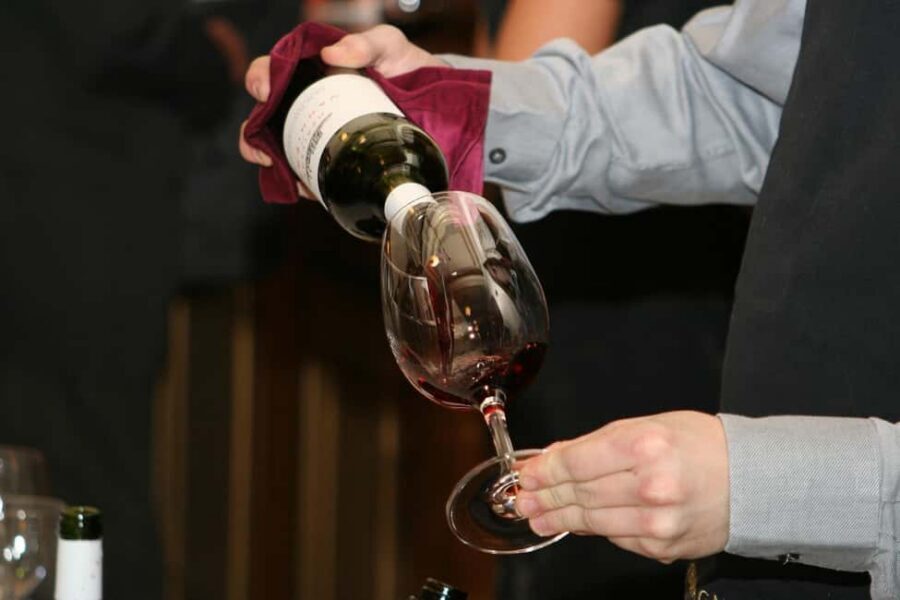 From Florence: Tuscany Hills Wine Tour - Winery storytelling and wine comparison at the first cellar